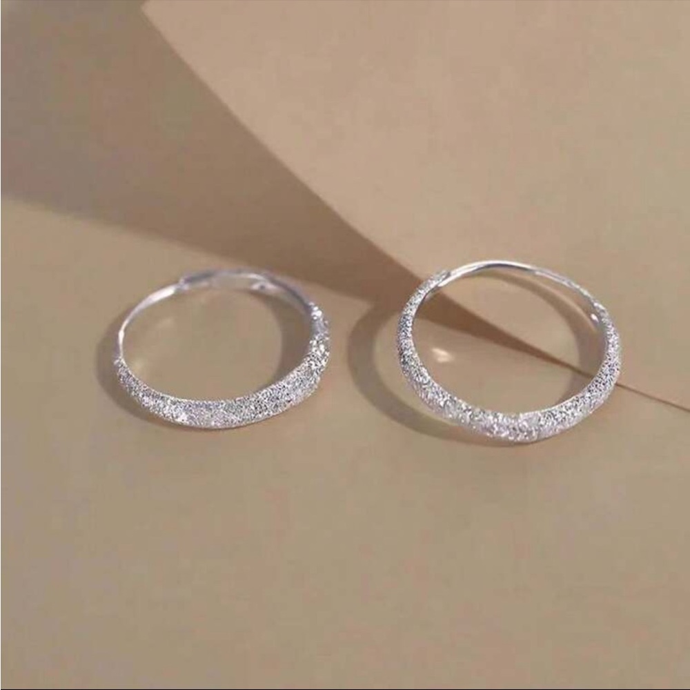 Sparkling Silver C-Shaped Hoop Earrings with Gemstone Embellishments